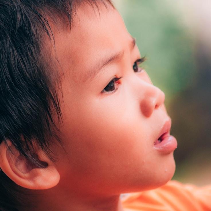 Avery Singh, Lead Design Curator at SkyPulseYonder, reviewing corporate floral arrangements